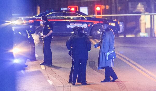 Atlanta police are investigating a possible homicide Tuesday in the 500 block of Whitehall Street. JOHN SPINK / JSPINK@AJC.COM