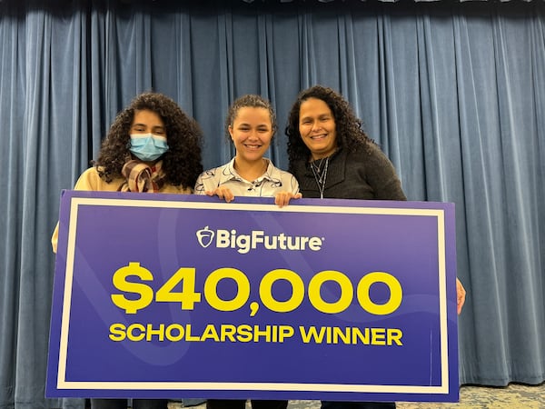 Gwinnett Online Campus senior Alyssa Perez, center, received a $40,000 BigFuture scholarship from the College Board. She is photographed with her sister Andrea Perez and mother Eunice Perez. (Courtesy of Gwinnett County Public Schools)