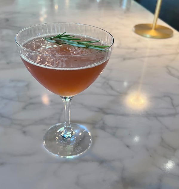 Bacchanalia's just peachy cocktail uses caramelized peaches and rosemary, which lends savory notes to the non-alcoholic tequila-based drink. (Courtesy of Bacchanalia)