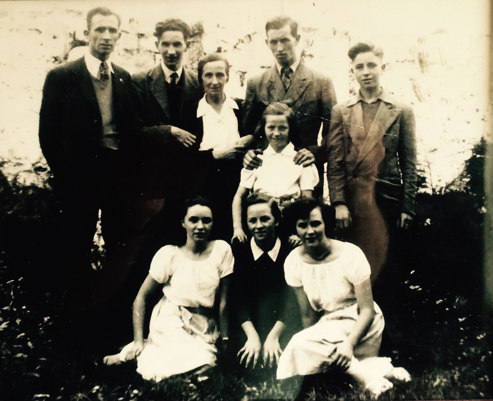 Josie Gilligan, standing center, with her eight surviving children. Joe, is top left, and Torpy's mother, Helen, is bottom left. Family photo