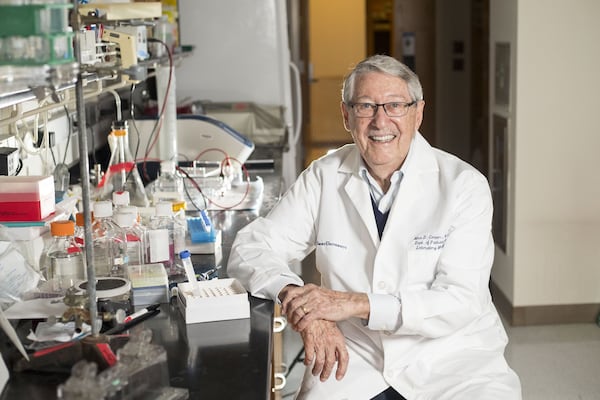 Dr. Max Cooper poses for a photo in a research laboratory next to his office at Emory University School of Medicine on Friday, Jan. 26, 2018. Cooper, a pediatrician and professor of pathology and laboratory medicine, is being honored in the category “Medical Science and Medicinal Science” for research that identified the cellular building blocks of the immune system as we understand it today.ALYSSA POINTER/ALYSSA.POINTER@AJC.COM