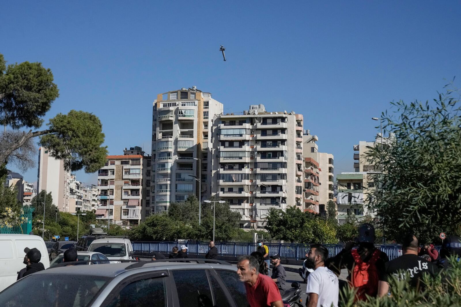 A missile launched from an Israeli jet hits a building in Ghobeiri, Beirut, Lebanon, Tuesday, Oct. 22, 2024. (AP Photo/Bilal Hussein)