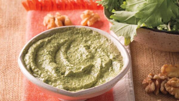 Ricotta and Garden Greens Pesto, published in Olwen Woodier’s “The Pesto Cookbook,” is a sort of “kitchen sink” recipe whose vibrant hue comes from immature garden greens, basil and chives. CONTRIBUTED BY LARA FERRONI