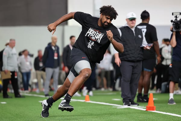 Georgia's Xavier Truss (73) runs a drill during the school's NFL Pro Day, Wednesday, March, 12, 2025, in Athens, Ga. (AP Photo/Colin Hubbard)