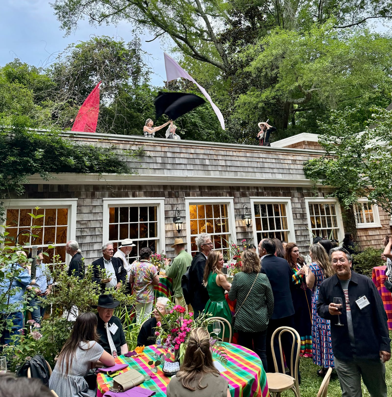 Beacon Dance performers took to the rooftop with flags and music while performing at Paradise Garden's Atlanta Patron Party in June. Courtesy of Paradise Garden Foundation