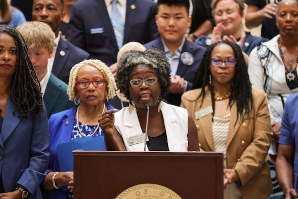 State Rep. Jasmine Clark, D–Lilburn, speaks at the Georgia State Capitol during a press conference on July 24, 2024, to respond to Georgia School Superintendent Richard Woods' decision against full approval of the AP African American Studies course. (Natrice Miller/ AJC)