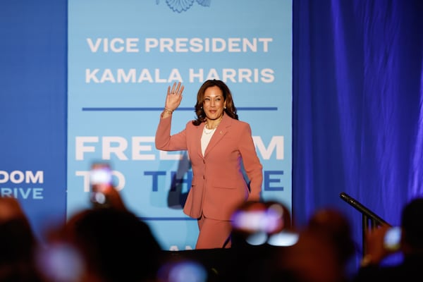 Vice President Kamala Harris walks onstage at an event Monday at the Georgia International Convention Center to kick off her economic tour focusing on improving opportunities for Black men. (Natrice Miller/ AJC)