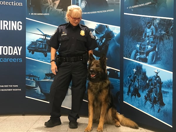 CBP officer Becky Shuford with her partner, Blesk, a Belgian Shepherd.