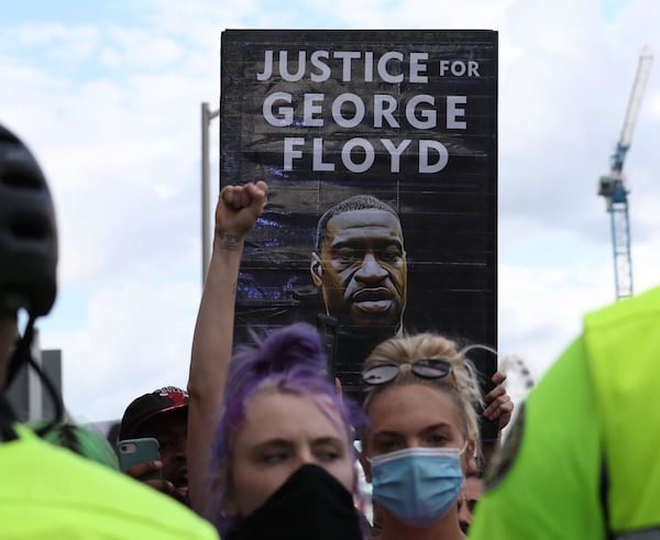 May 29, 2020 — Atlanta — After a peaceful march the Georgia State Capitol that swelled into the hundreds, protestors returned to the area around the Centennial Olympic Park and CNN center where some confronted police, who sprayed some demonstrators with pepper spray. They carried signs and chanted their messages of outrage over the death of George Floyd in Minneapolis. ALYSSA POINTER / ALYSSA.POINTER@AJC.COM