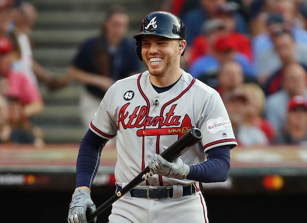 Freddie Freeman of the Braves smiles during an at-bat.  (Photo by Gregory Shamus/Getty Images)