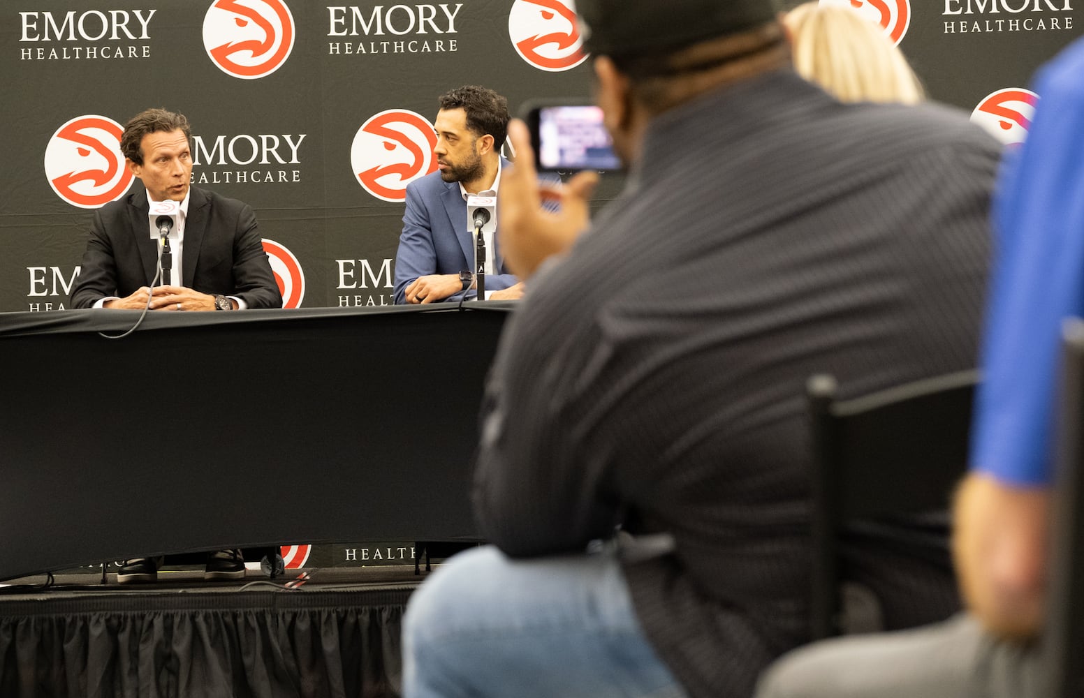 230227-Brookhaven-New Hawks Head Coach Quin Snyder, left, and General Manager Landry Fields hold a press conference Monday afternoon, Feb. 27, 2023. Ben Gray for the Atlanta Journal-Constitution