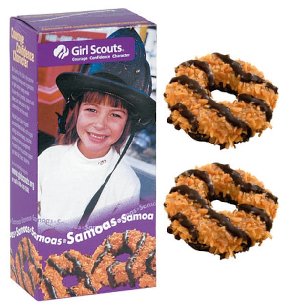 SAMOAS - Tender vanilla cookies, covered with caramel, rolled in toasted coconut, and striped with a rich, chocolaty coating.