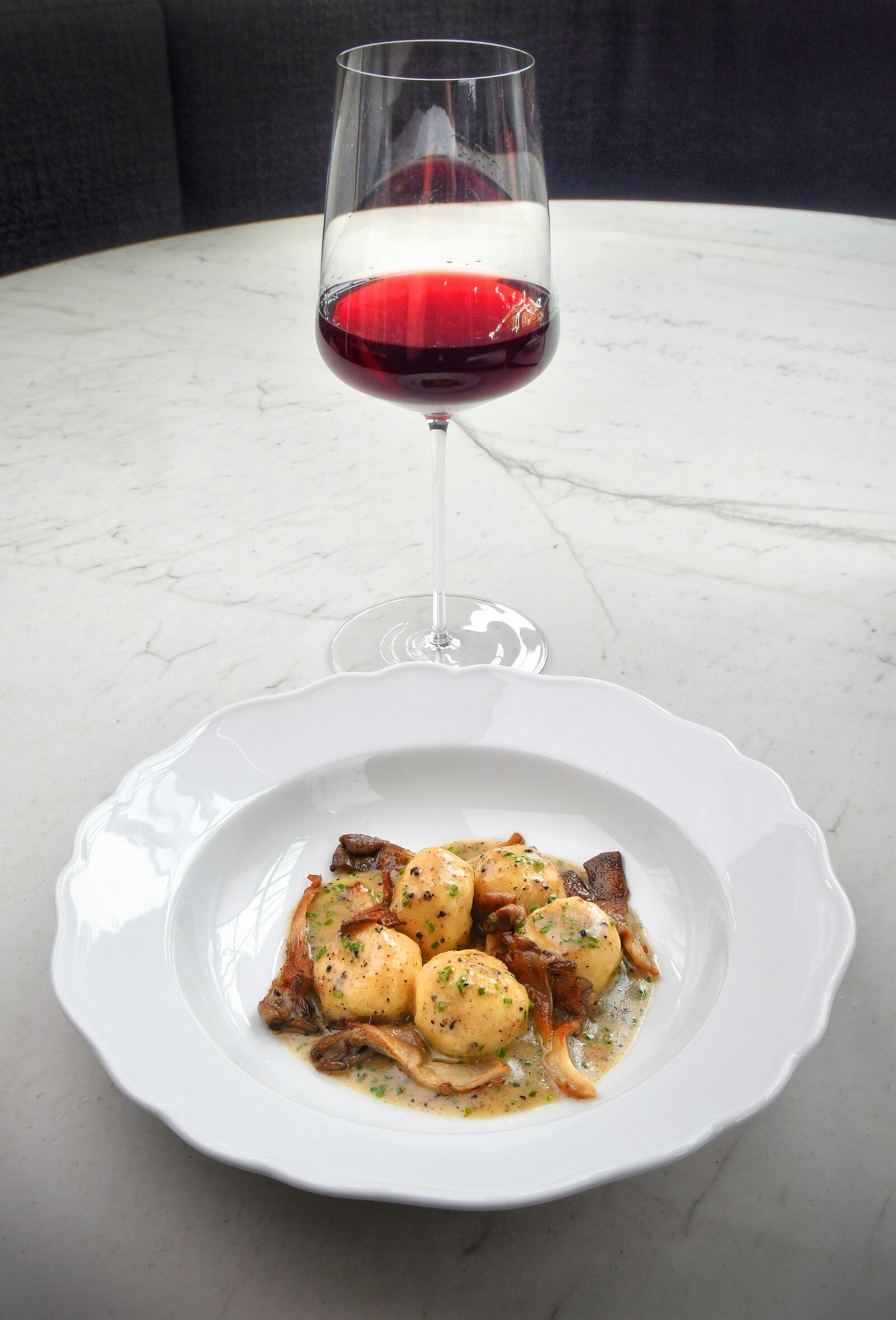 Lucian Books and Wine's ricotta gnudi sauteed with oyster mushrooms and truffle beurre monté. (Chris Hunt for The Atlanta Journal-Constitution)