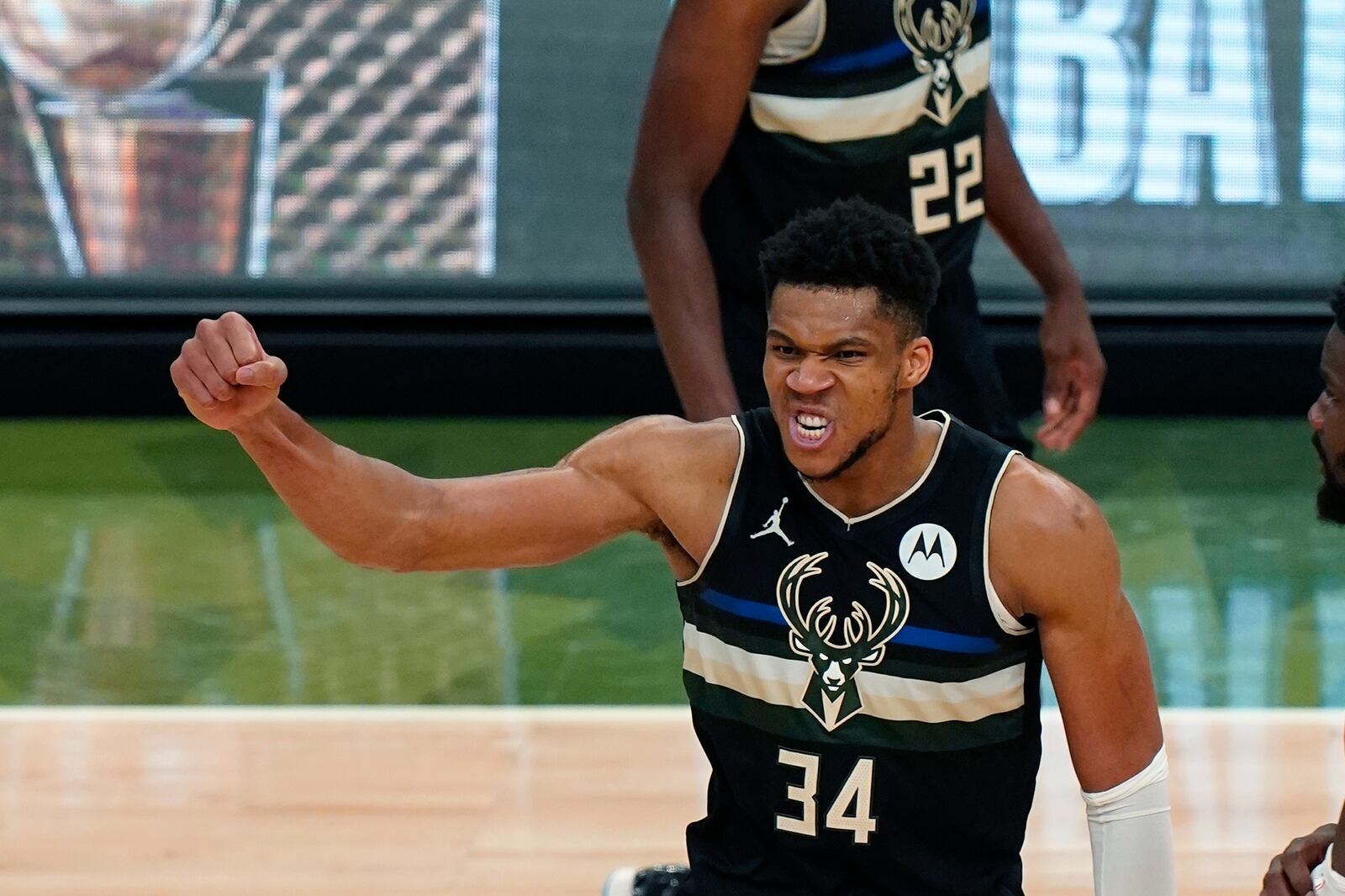 Milwaukee Bucks forward Giannis Antetokounmpo (34) reacts during the second half of Game 6 of basketball's NBA Finals against the Phoenix Suns in Milwaukee, Tuesday, July 20, 2021. (AP Photo/Paul Sancya)