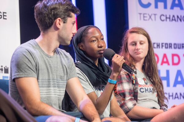 Nurah Abdulhaqq (center), a local teen that attends Chapel Hill High School in Douglasville, speaks during a March For Our Lives rally at Eagles Nest Church in Roswell, Monday, July 30, 2018.  (ALYSSA POINTER/ALYSSA.POINTER@AJC.COM)