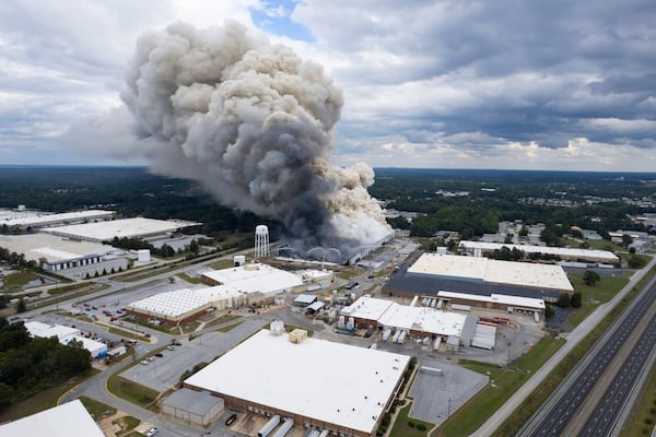 Smoke billows from a fire at the BioLab facility in Conyers Sept. 29, 2024.