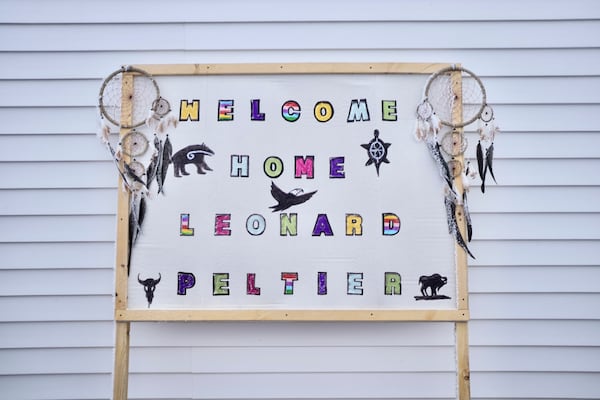 A "Welcome Home" sign is displayed for Leonard Peltier in Belcourt, N.D, on Tuesday, Feb. 25, 2025. (AP Photo/Mark Vancleave)