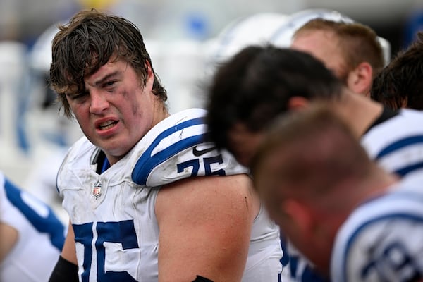 FILE - Indianapolis Colts guard Will Fries (75) talks to teammates on the sideline against the Jacksonville Jaguars during the second half of an NFL football game, Oct. 6, 2024, in Jacksonville, Fla. (AP Photo/Phelan M. Ebenhack, file)