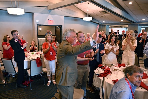 US Rep. Mike Collins receives a standing ovation Wednesday from the Georgia delegation to the Republican National Convention. (Hyosub Shin / AJC)