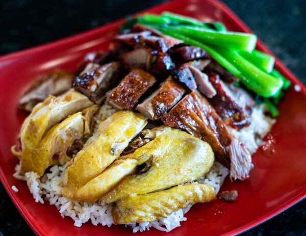 A three-meat Mixed BBQ Combo with pork, duck and soy chicken from BBQ Corner in the Jusgo Food Court. CONTRIBUTED BY HENRI HOLLIS