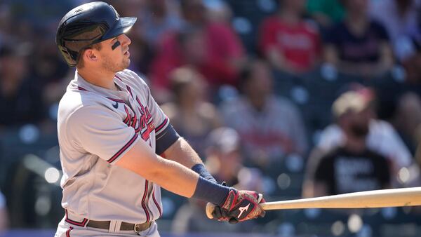 Braves third baseman Austin Riley follows the flight of his two-run home run off Colorado Rockies relief pitcher Julian Fernandez in the seventh inning Sunday, Sept. 5, 2021, in Denver. (David Zalubowski/AP)