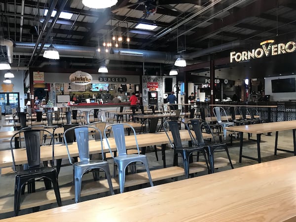 The dining room at Marietta Square Market food hall currently is closed for sit-down dining. LIGAYA FIGUERAS / LIGAYA.FIGUERAS@AJC.COM