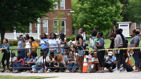 Students wait outside for former first lady Michelle Obama as she talks to students from Spelman College and Morehouse College at Giles Hall on the Spelman College campus on Saturday, May 11, 2019. The students spent this past semester studying Obama’s book “Becoming” as a foundational text of their political science class “Black Women: Developing Public Leadership Skills.” HYOSUB SHIN / HSHIN@AJC.COM