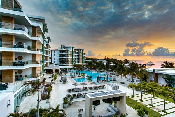 The Alaia Belize resort features a rooftop pool and sweeping views of the western Caribbean.
(Courtesy of Alaia Belize)