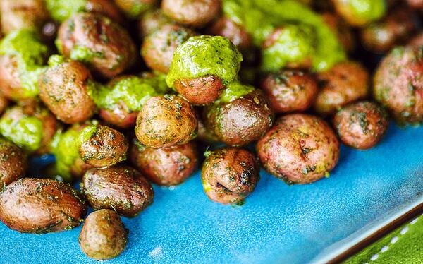 Ruby Sensation potatoes with garlic-cilantro mojo. (Andrew Rush/Pittsburgh Post-Gazette/TNS)