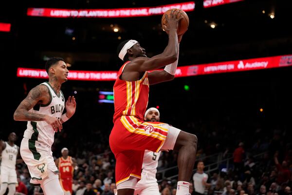 Atlanta Hawks guard Caris LeVert (3) shoots the ball in the first half of an NBA basketball game against the Milwaukee Bucks, Tuesday, March 4, 2025, in Atlanta. (AP Photo/Brynn Anderson)