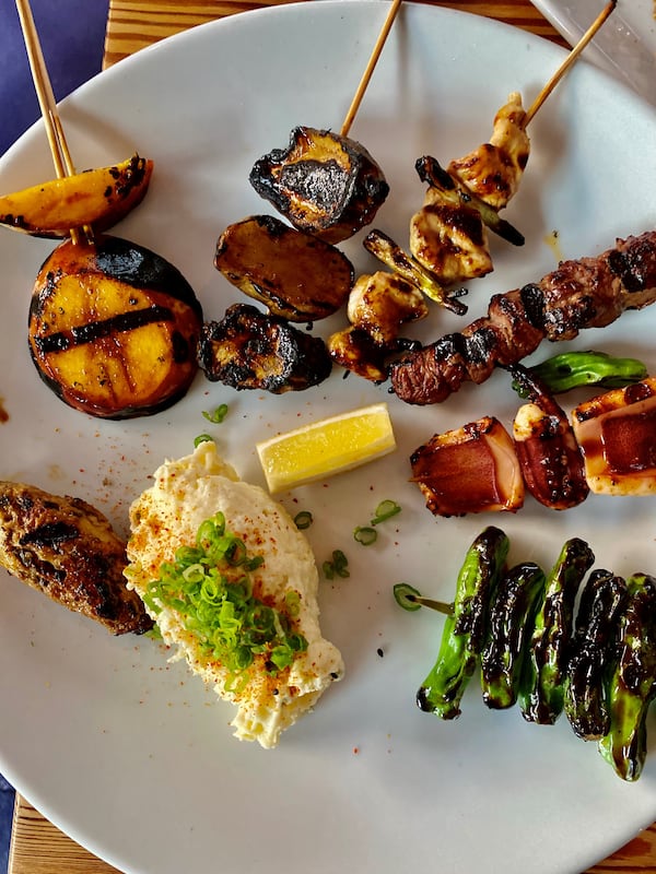 8Arm’s assortment of kushiyaki (grilled skewers) comes with a wonderful potato salad. (Wendell Brock for The Atlanta Journal-Constitution)