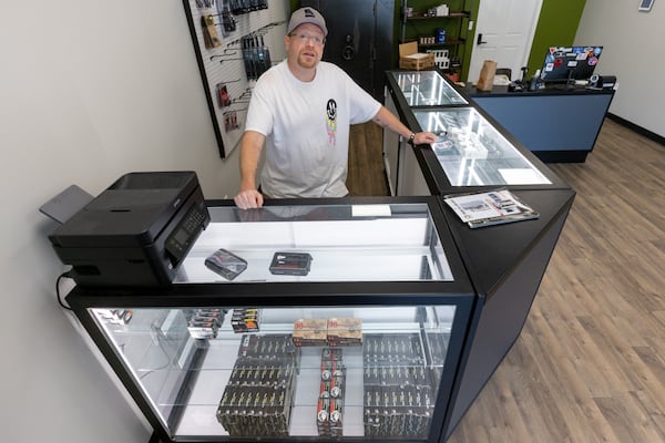 John Waldren says he's “still very Second Amendment," even though he closed his gun store in Duluth out of concern about gun violence. "I just don’t want to sell things when you can buy something with me, then you can go somewhere and they tell you that you can’t bring your gun in,” he said. “So you leave it in the car. And then it can get stolen and end up in the hands of criminals who use that gun to commit crimes.” (Steve Schaefer/steve.schaefer@ajc.com)