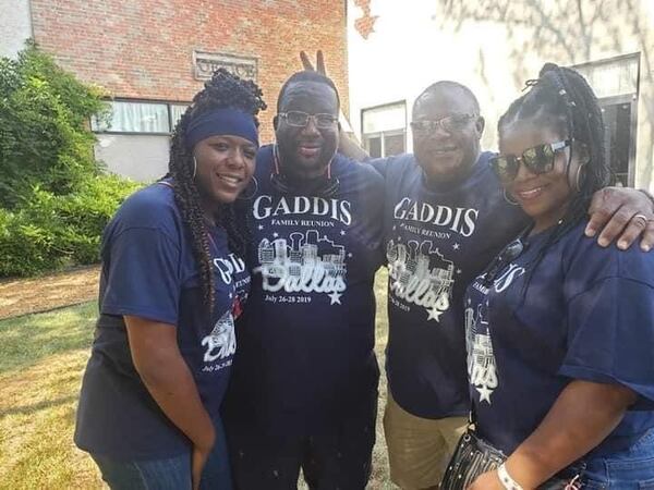 Sierra McKinley (from left), Garcia Gaddis, Wayne Gaddis and Katia Gaddis show off their family pride during a reunion.