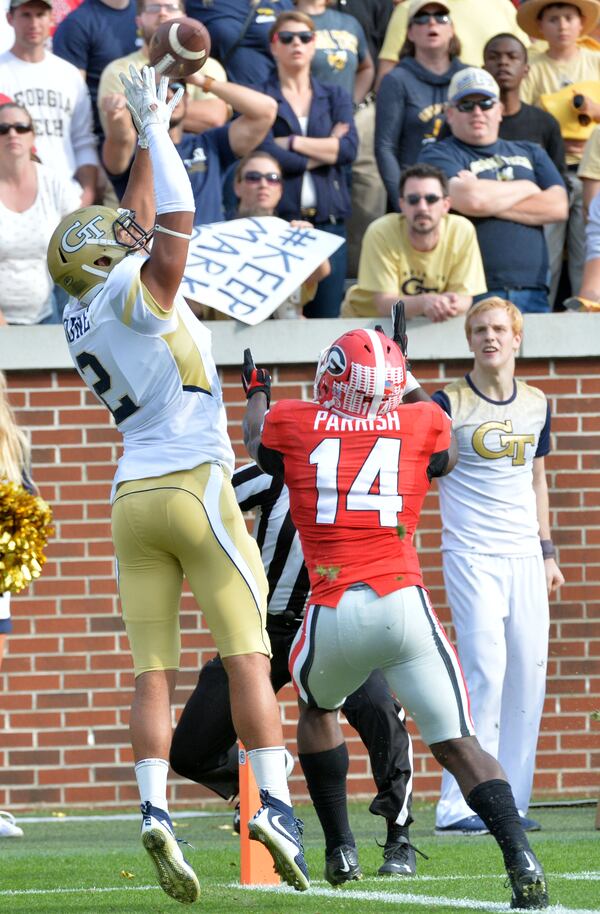 November 28, 2015 Atlanta - Georgia Tech Yellow Jackets wide receiver Ricky Jeune (2) catches a touchdown pass under pressure from Georgia Bulldogs cornerback Malkom Parrish (14) in the second half at Bobby Dodd Stadium on Saturday, November 28, 2015. Georgia Bulldogs won 13 - 7 over the Georgia Tech Yellow Jackets. HYOSUB SHIN / HSHIN@AJC.COM