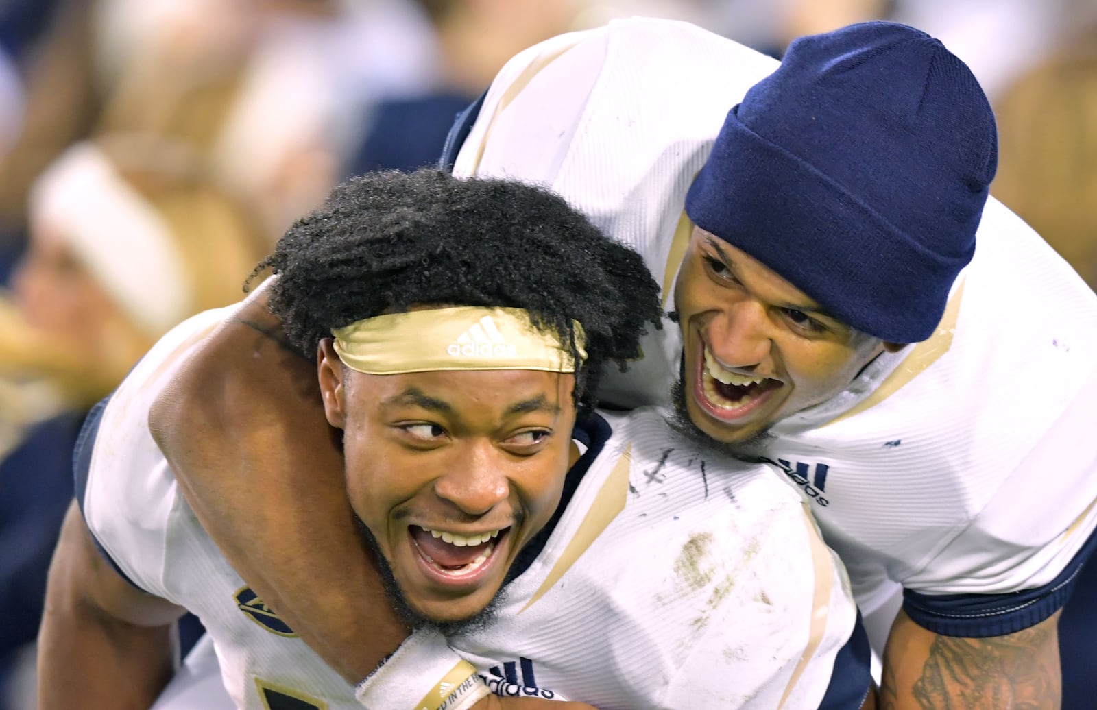 TaQuon Marshall and Tobias Oliver celebrate their victory over the Miami this season at Bobby Dodd Stadium.