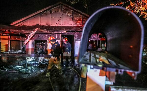 Atlanta firefighters battled the deadly house fire Dec. 13.