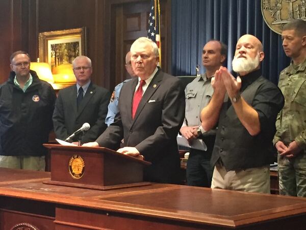 Gov. Nathan Deal and state officials brief reporters on the deadly storms in South Georgia during a news conference Monday at the Capitol. AARON GOULD SHEININ | ASHEININ@AJC.COM