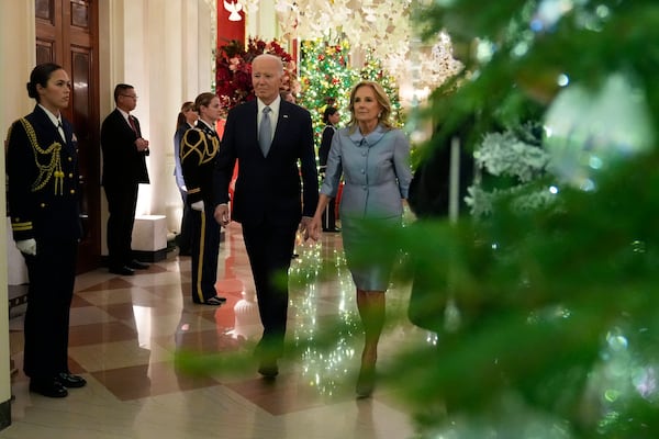 President Joe Biden and first lady Jill Biden arrive for the White House Conference on Women's Health Research event in the East Room of the White House in Washington, Wednesday, Dec. 11, 2024. (AP Photo/Susan Walsh)