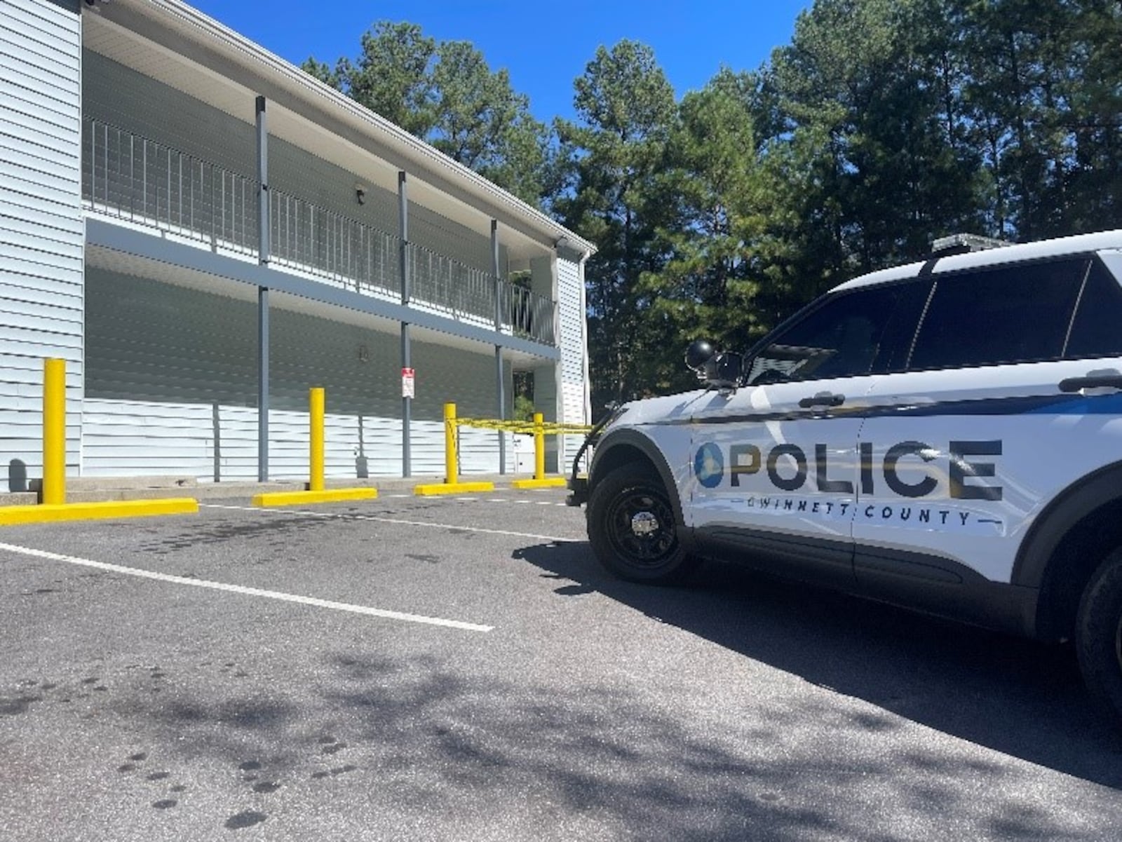 The day's second fatal shooting in Gwinnett County took place behind the Budgetel Inn and Suites on Stone Mountain Highway.