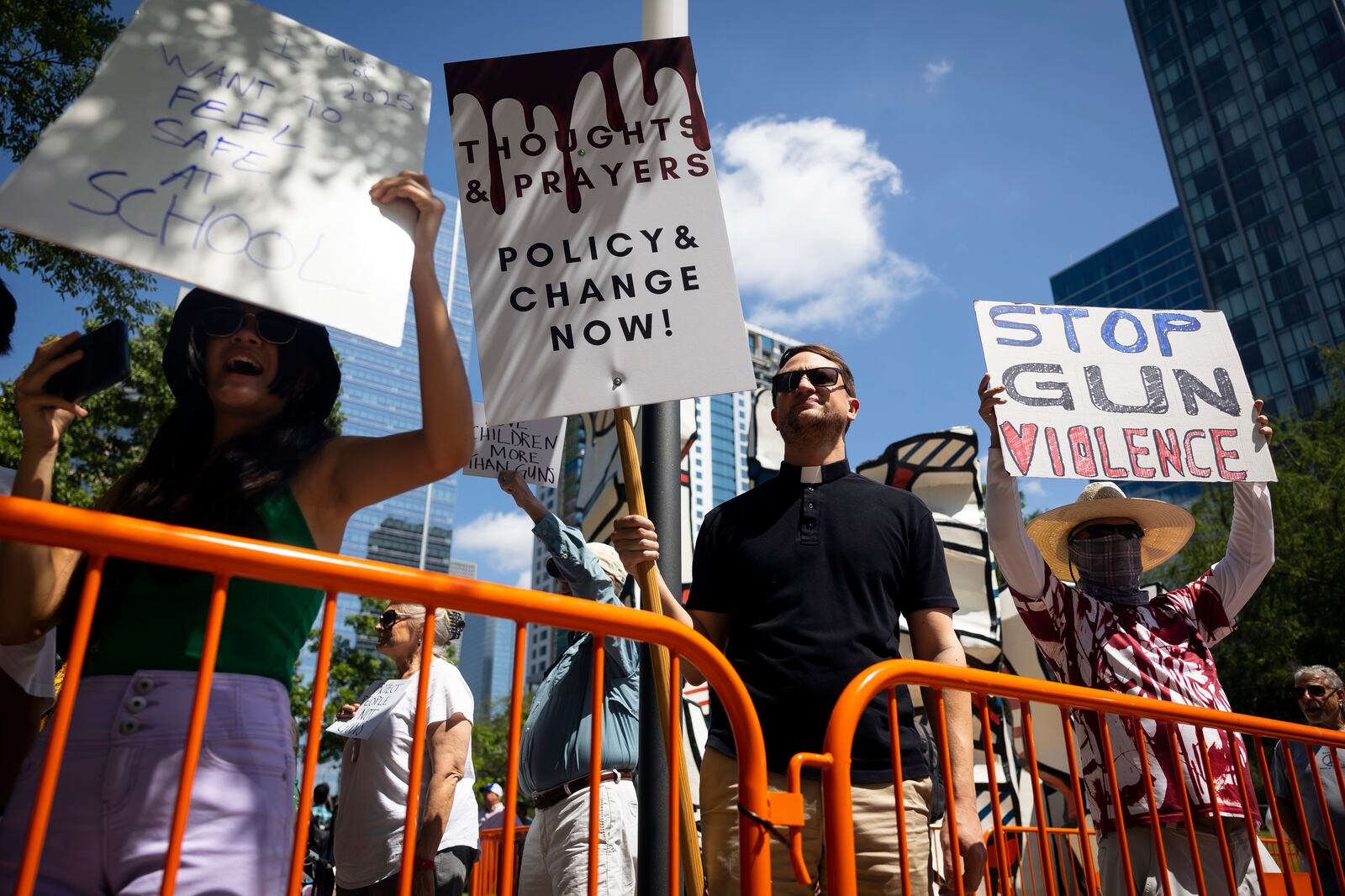 The Rev. Bodie Gilbert, pastor of the Bering Memorial United Church of Christ, takes part in a protest rally outside the annual convention of the National Rifle Association in Houston on Friday, May 27, 2022. The convention opened days after the school shooting in Uvalde, Texas, which killed 19 elementary school students and two teachers. (Annie Mulligan/The New York Times)