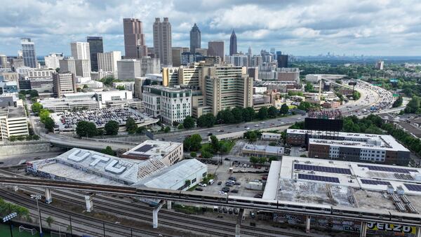 In this areal image the Atlanta downtown skyline is seen on Wednesday, May 15, 2024. Atlanta is experiencing a population surge that outpaces other cities. (Miguel Martinez / AJC)