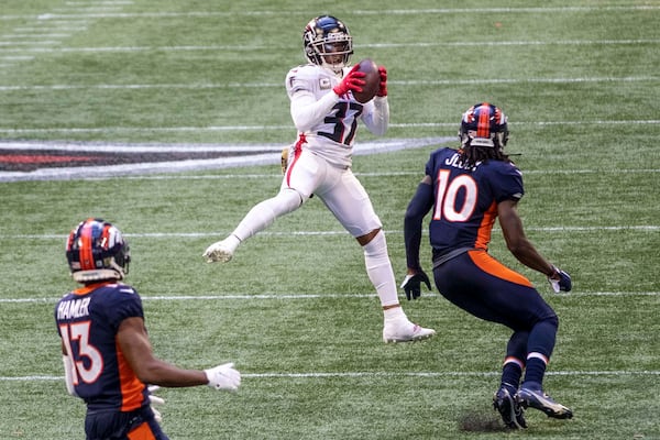 Falcons free safety Ricardo Allen (37) intercepts a throw from Denver Broncos quarterback Drew Lock during the second half Sunday, Nov. 8, 2020, at Mercedes-Benz Stadium in Atlanta. The Falcons won 34-27. (Alyssa Pointer / Alyssa.Pointer@ajc.com)