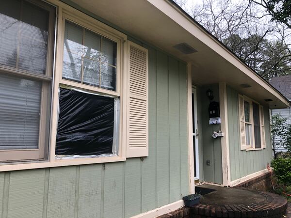 A window busted on Anitra Gunn's home. Fort Valley police allege her boyfriend DeMarcus Little did it two weeks before her body was found.