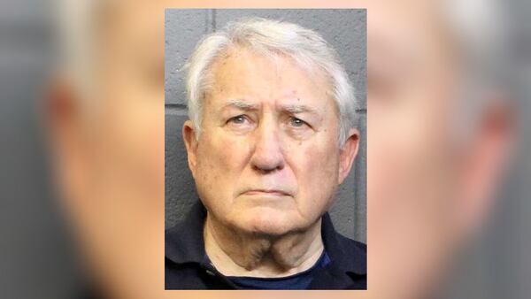 Gus Harter, 80, was being held without bond late Tuesday.