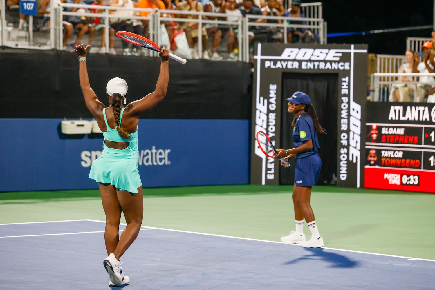 Sloane Stephens reacts with a ball boy as she plays a point on her behalf against Taylor Townsend during an exhibition match at the Atlanta Open in Atlantic Station on Sunday, July 21, 2024, in Atlanta.
(Miguel Martinez / AJC)