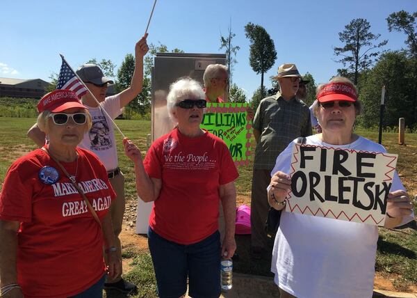  Protesters are calling for the teacher to be fired. ELLEN ELDRIDGE / ELLEN.ELDRIDGE@AJC.COM