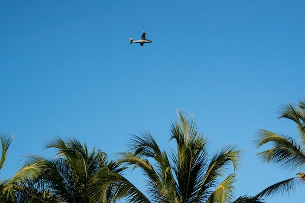 A military plane searches for Sudiksha Konanki, a university student from the U.S. who disappeared on a beach in Punta Cana, Dominican Republic, Monday, March. 10, 2025. (AP Photo/Francesco Spotorno)