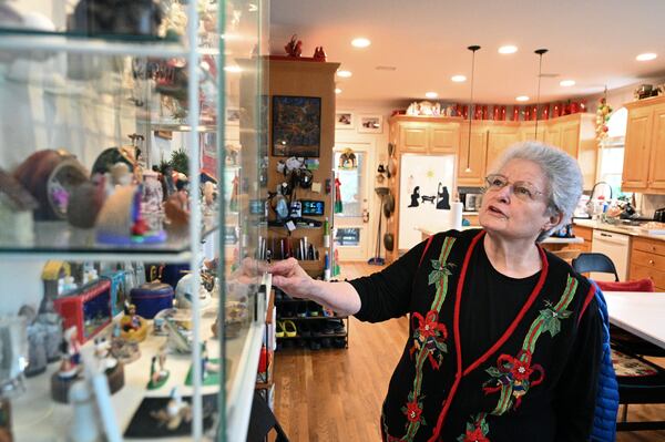 Marielos Bond shows her collection of over 1,000 nativity scenes decorated in every corner of her house in Alpharetta on Saturday, December 17, 2022. Marielos has collected the nativity scenes for more than 40 years. (Hyosub Shin / Hyosub.Shin@ajc.com)