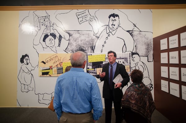 Danny King, co-curator of the “Vedem Underground” exhibit at the Breman Museum, talks to visitors. He said the boys “were not victims. They were courageous and sought out the truth at great risk.” The student writers used nicknames like, "Baked glasses," and "Beanie" to hide their identities. CONTRIBUTED BY THE BREMAN MUSEUM