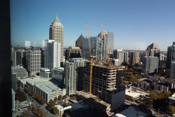 A view of Midtown and construction from the newly completed office tower Spring Quarter in Atlanta on Monday, December 2, 2024. It's the largest office building that will be delivered in 2024 and one of the last ones being built in Midtown of this size, likely for years. (Arvin Temkar / AJC)